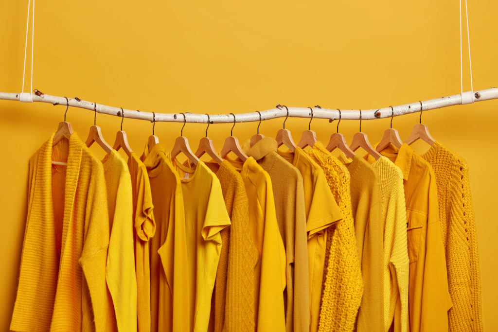 Rack with yellow clothes a